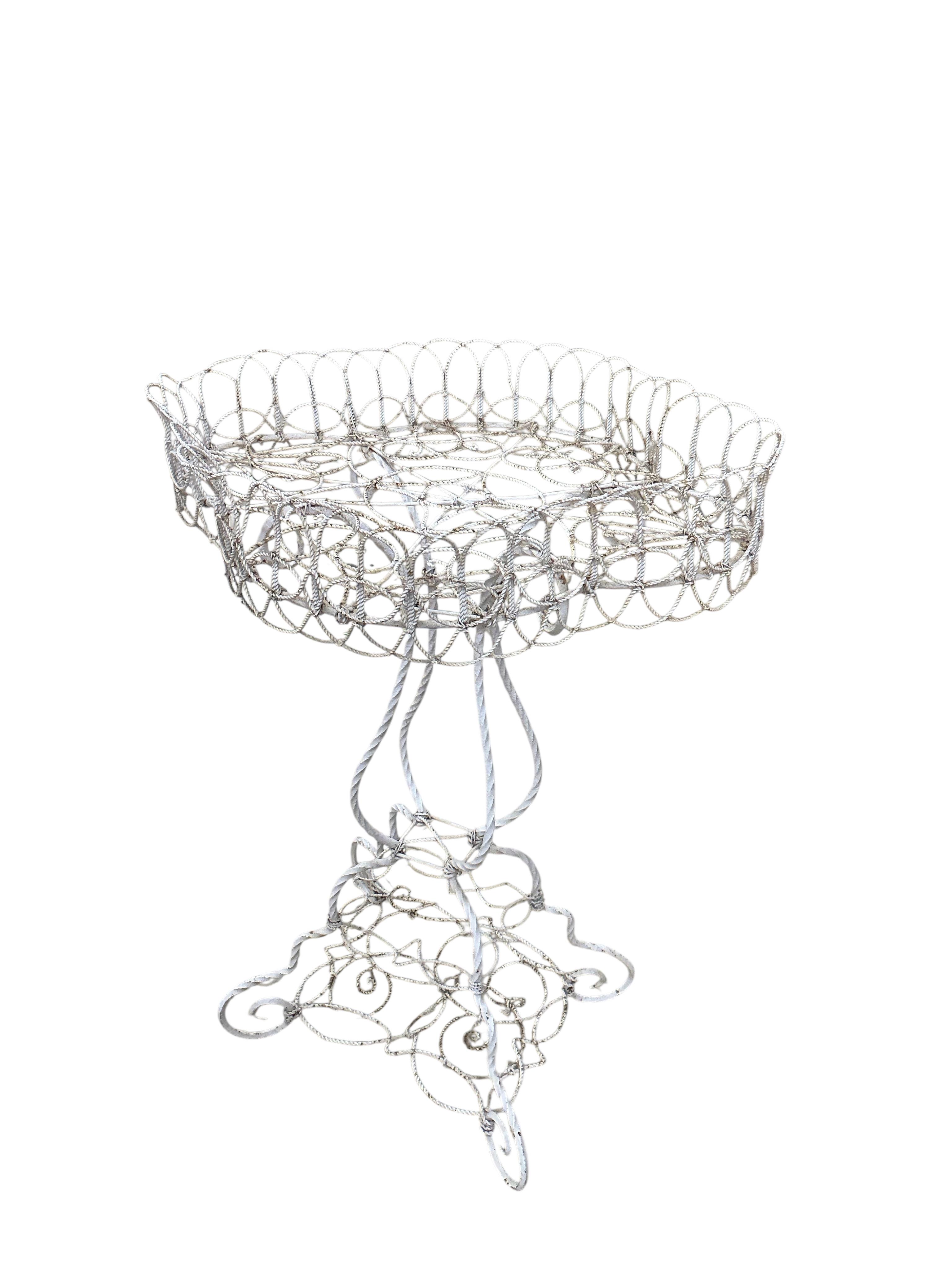 A Victorian wirework plant stand, width 60cm, depth 50cm, height 82cm